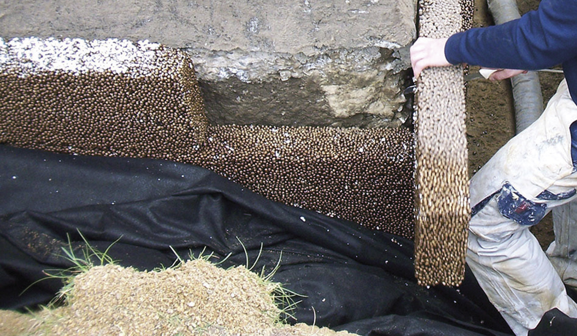 Pordrän: Effektiv isolering og dræning holder kældervæggen tør