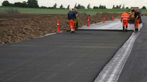 Udlægning af HaTelit® asfaltarmering Udlægning af HaTelit® asfaltarmering
